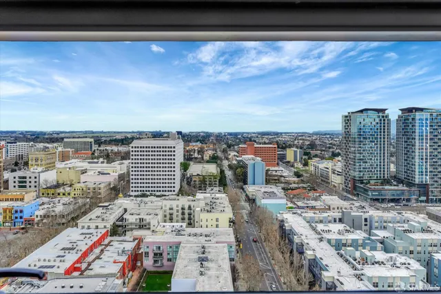 a kitchen with stainless steel appliances granite countertop a stove and a refrigerator