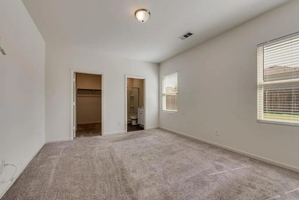 6830 Bonanza Way Forney, TX 75126 - Photo 7 of 14 an empty room with windows