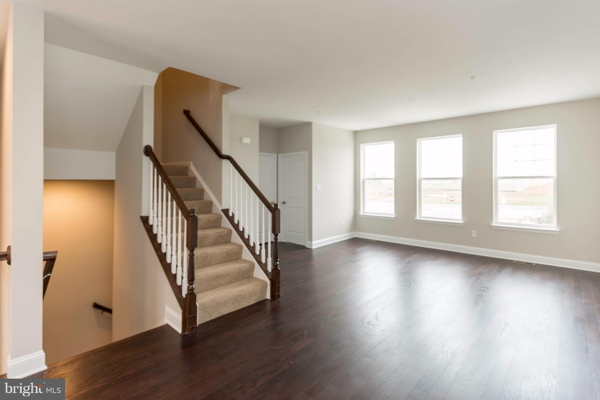4609 Cambria Road Frederick, MD 21703 - Photo 7 of 29 a view of an entryway with wooden floor