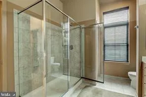 a view of an empty room and a window