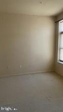 1209 North Charles Street, Unit 302 Baltimore, MD 21201 - Photo 18 of 25 a view of an empty room and a window