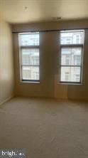 1209 North Charles Street, Unit 302 Baltimore, MD 21201 - Photo 19 of 25 an empty room with a window