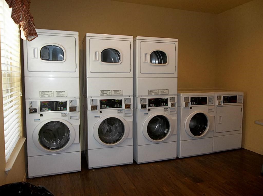 321 Thomas Burleson, TX 76028 - Photo 6 of 6 a utility room with dryer and washer