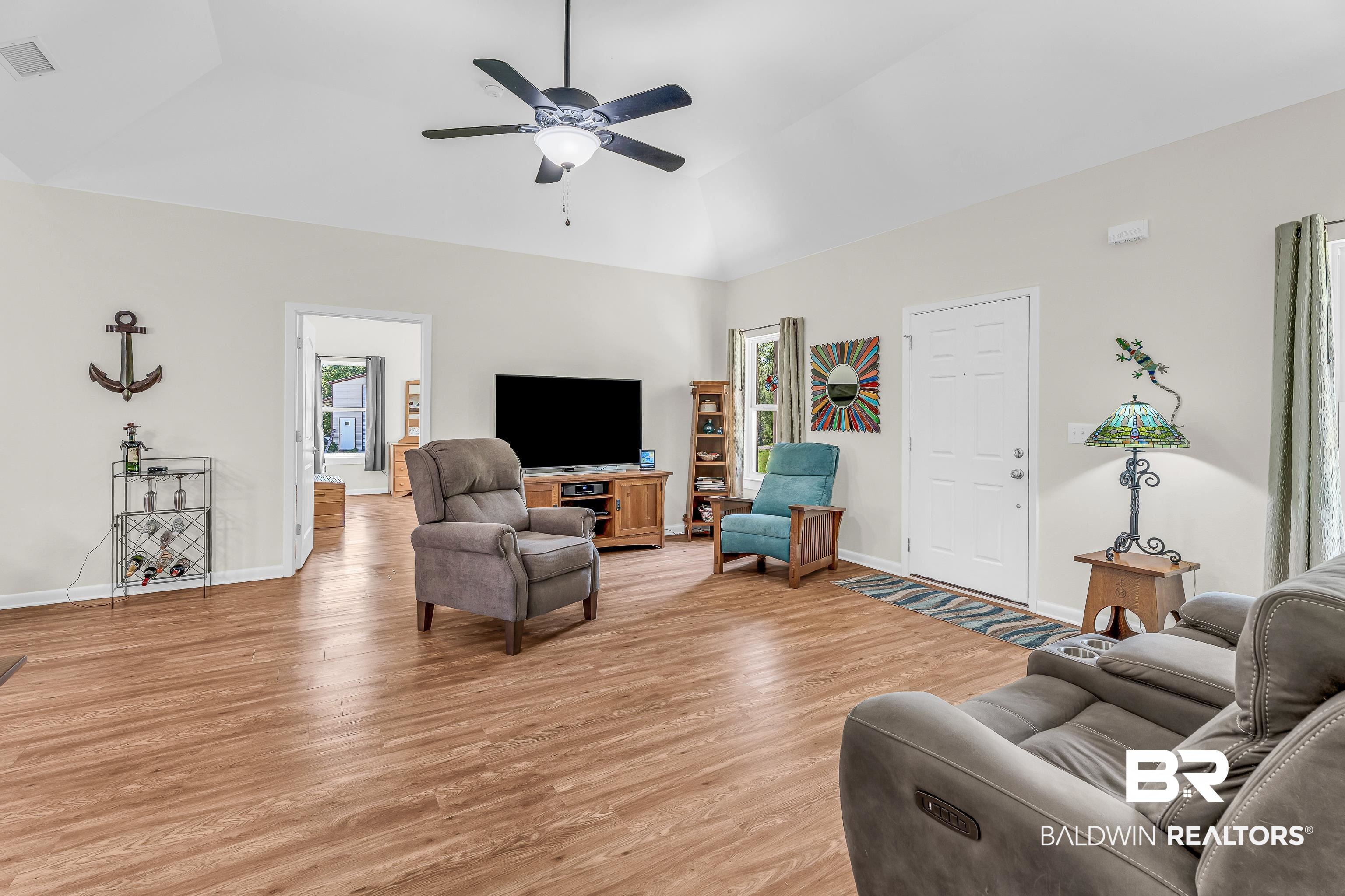 18255 Cactus Court Elberta, AL 36530 - Photo 12 of 53 Living room featuring light wood finished floors, ceiling fan, and lofted ceiling