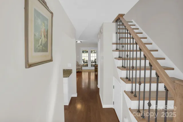 a view of entryway with wooden floor