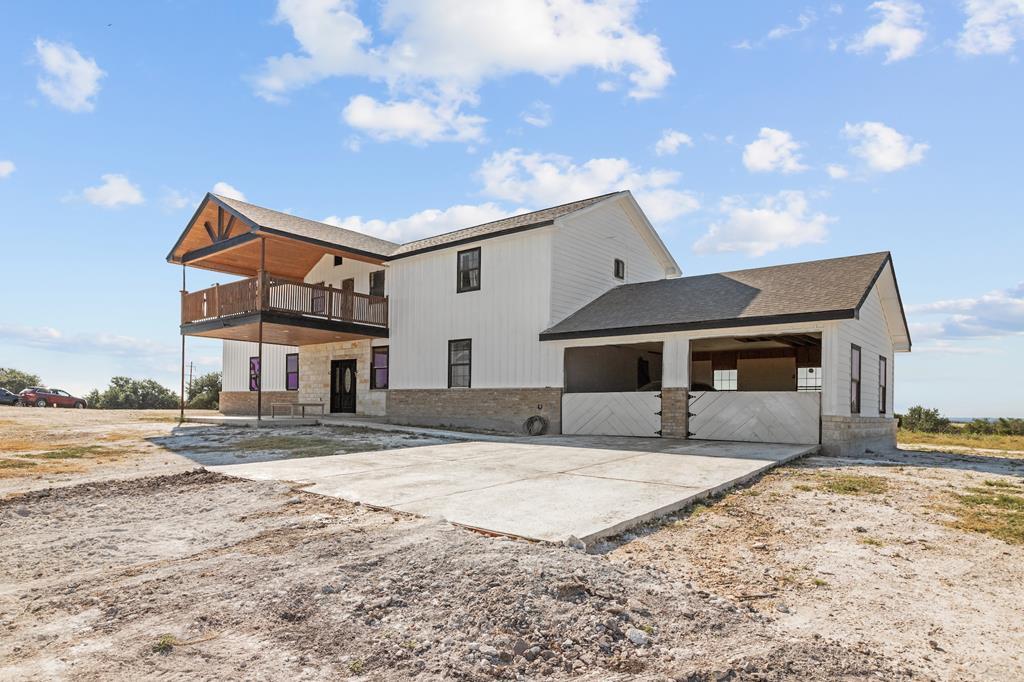 288.000000 Kroll Road Harper, TX 78631 - Photo 2 of 49 a front view of a house with a yard