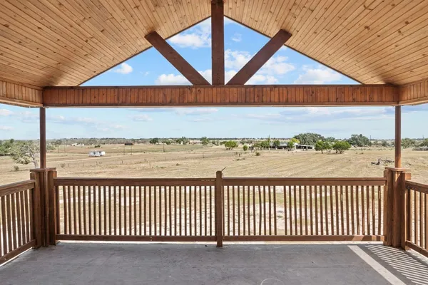 a view of a terrace with city view
