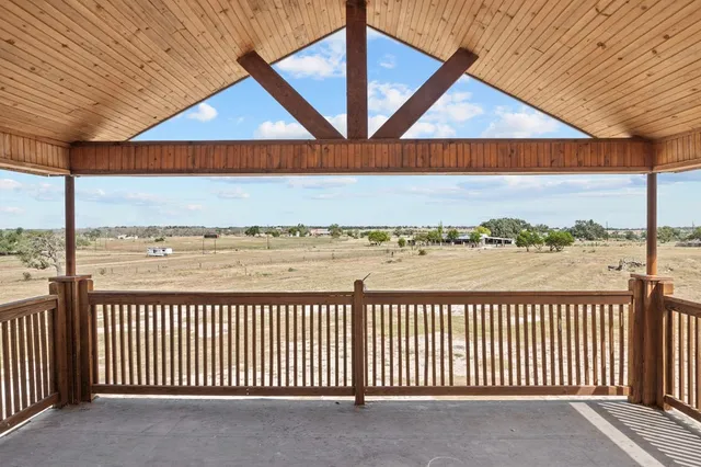 a view of a terrace with city view