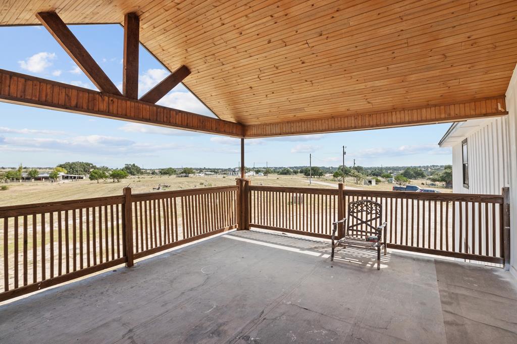 288.000000 Kroll Road Harper, TX 78631 - Photo 24 of 49 a view of a terrace with city view