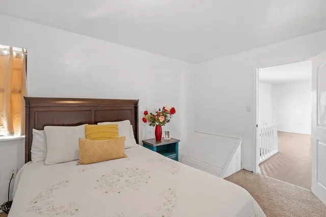 a bathroom with a toilet sink and shower