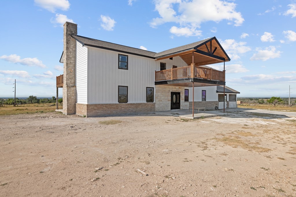 288.000000 Kroll Road Harper, TX 78631 - Photo 37 of 49 a view of a house with a snow on the road