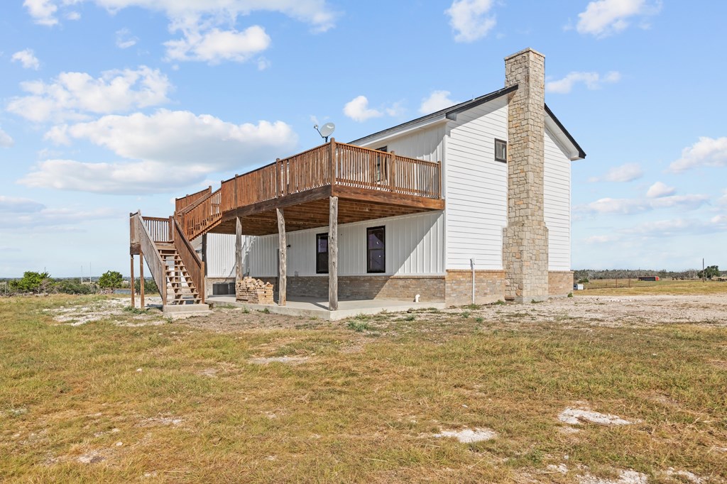 288.000000 Kroll Road Harper, TX 78631 - Photo 40 of 49 a view of a house with a yard