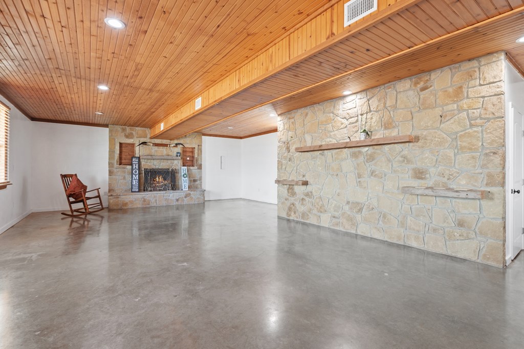 288.000000 Kroll Road Harper, TX 78631 - Photo 4 of 49 a view of a livingroom with furniture and a flat screen tv