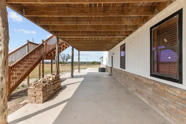 a backyard of a house with a stove