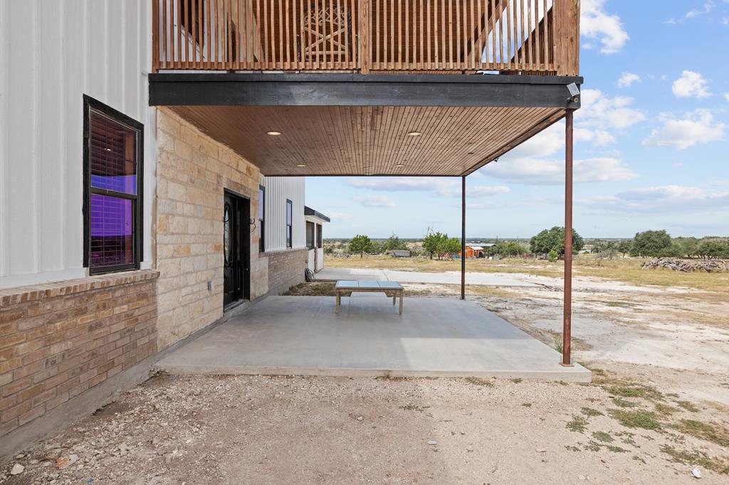 288.000000 Kroll Road Harper, TX 78631 - Photo 48 of 49 a backyard of a house with a stove
