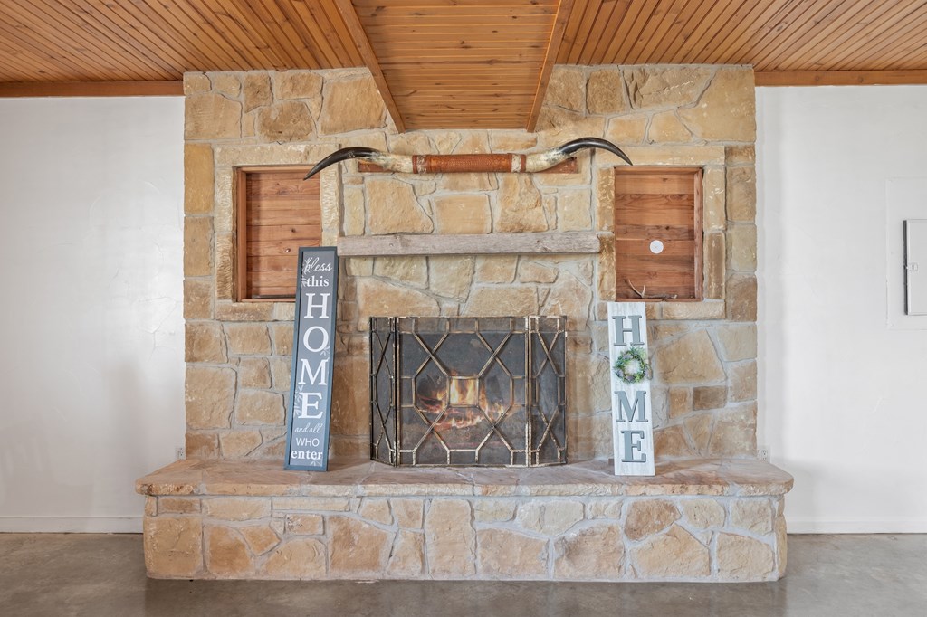 288.000000 Kroll Road Harper, TX 78631 - Photo 9 of 49 a living room with a fireplace