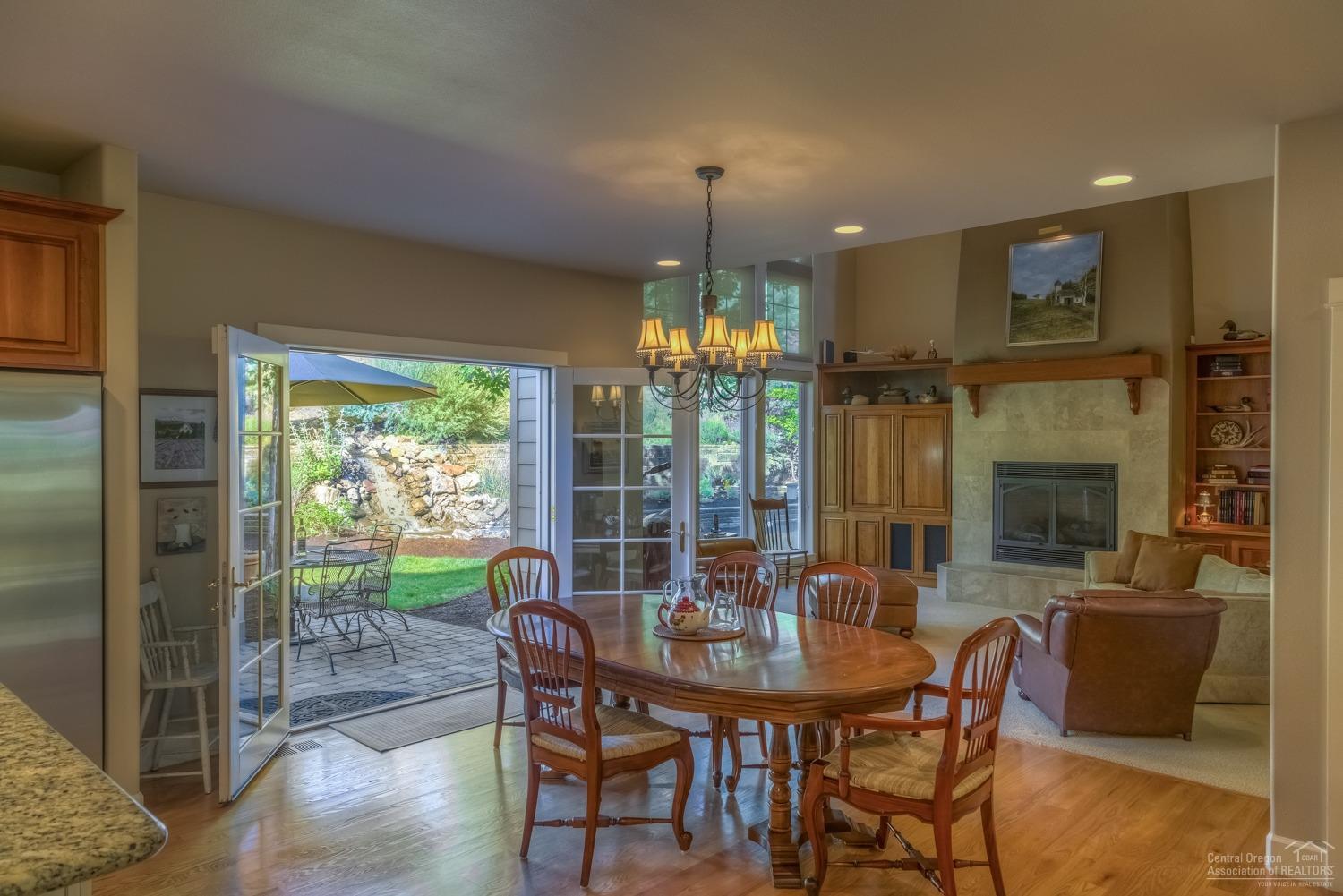 681 Sundance Ridge Court Redmond, OR 97756 - Photo 7 of 24 Additional dining space and french doors