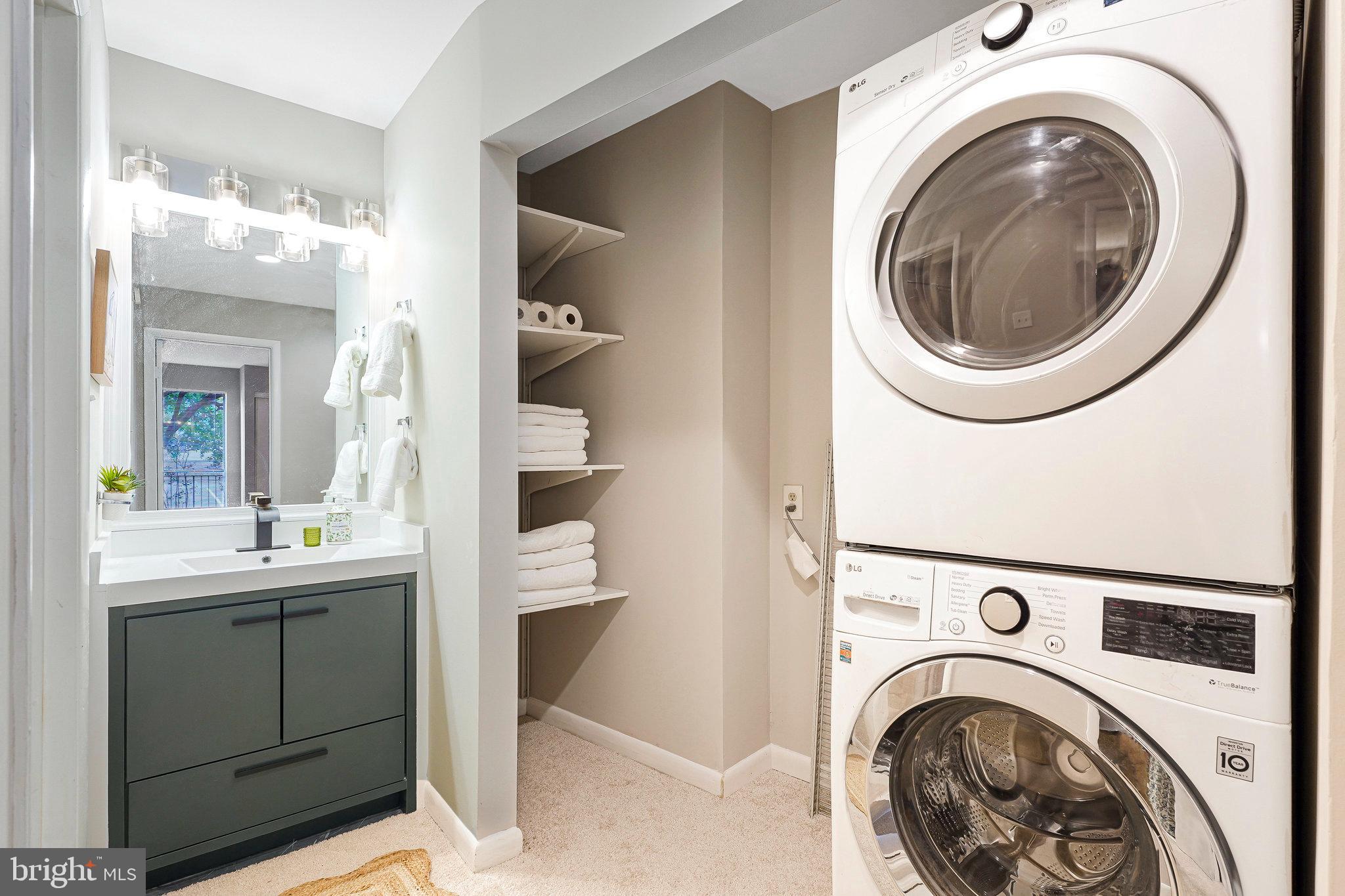 5778 Rexford Court, Unit 5778B Springfield, VA 22152 - Photo 17 of 55 a view of a hallway with washer and dryer