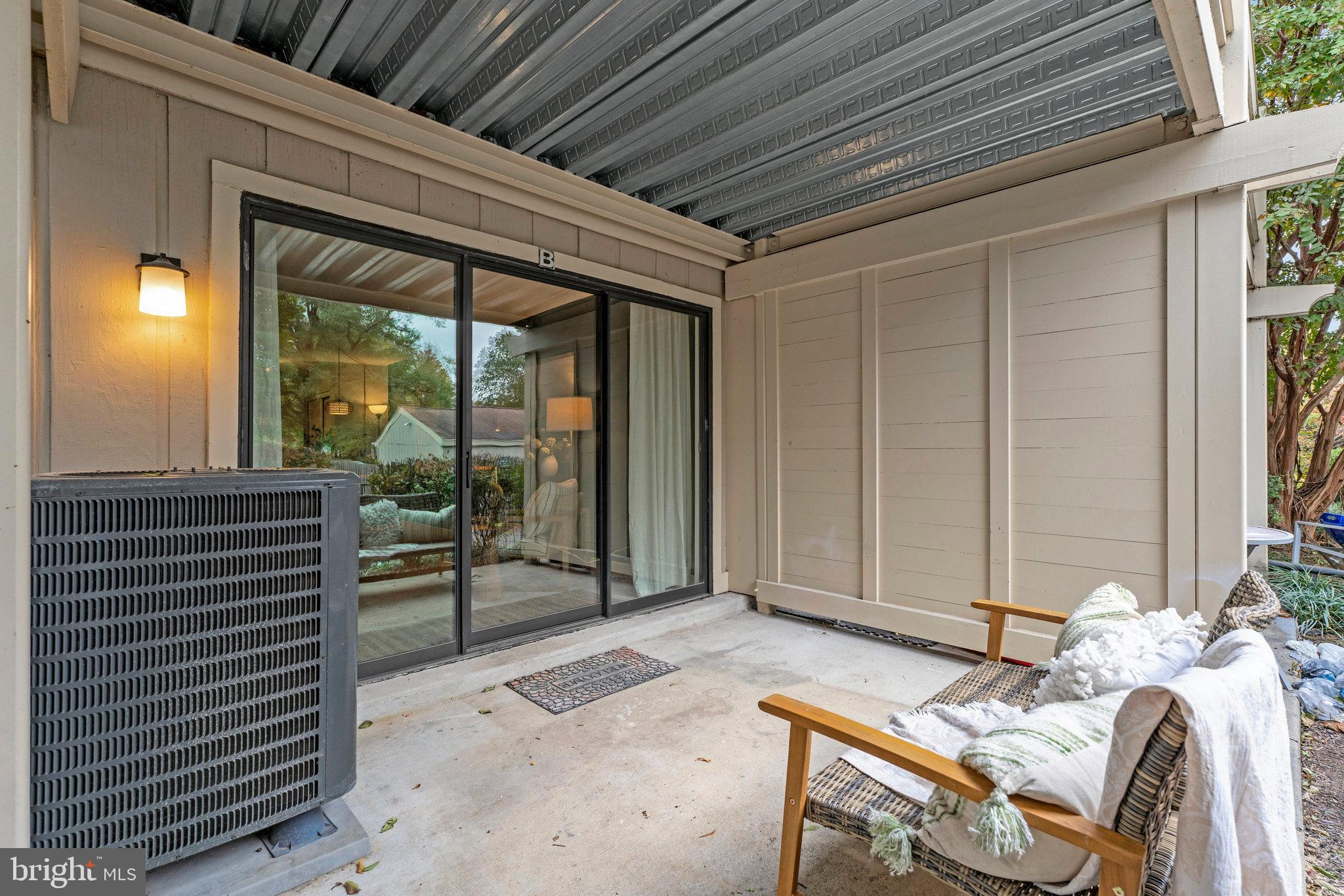 5778 Rexford Court, Unit 5778B Springfield, VA 22152 - Photo 20 of 55 a balcony view with a couple of chairs