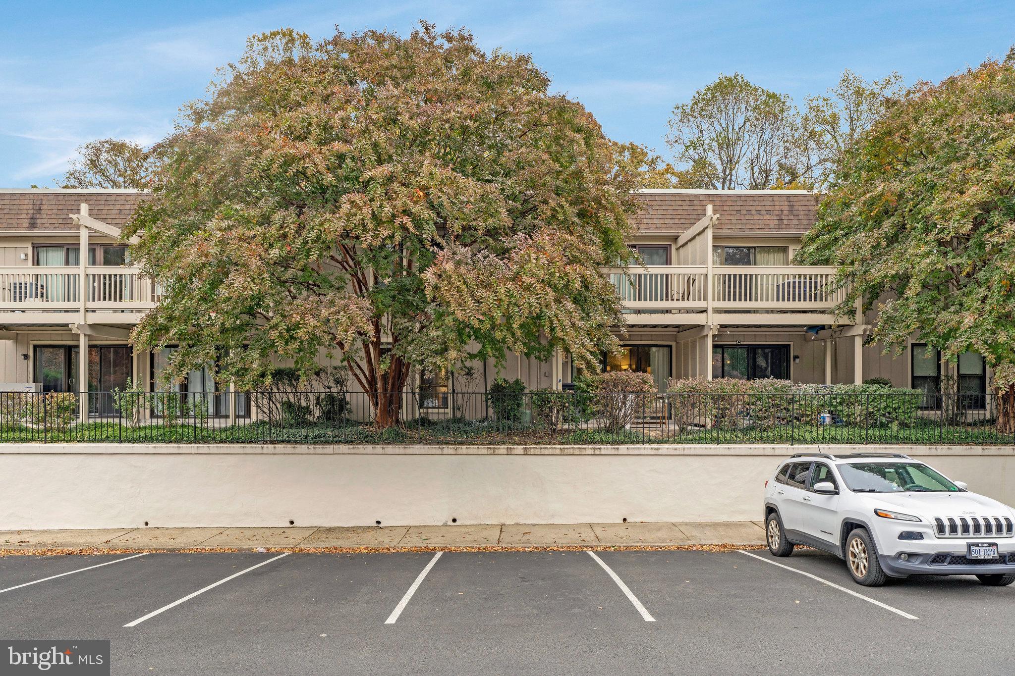 5778 Rexford Court, Unit 5778B Springfield, VA 22152 - Photo 23 of 55 a view of a cars park in front of a building