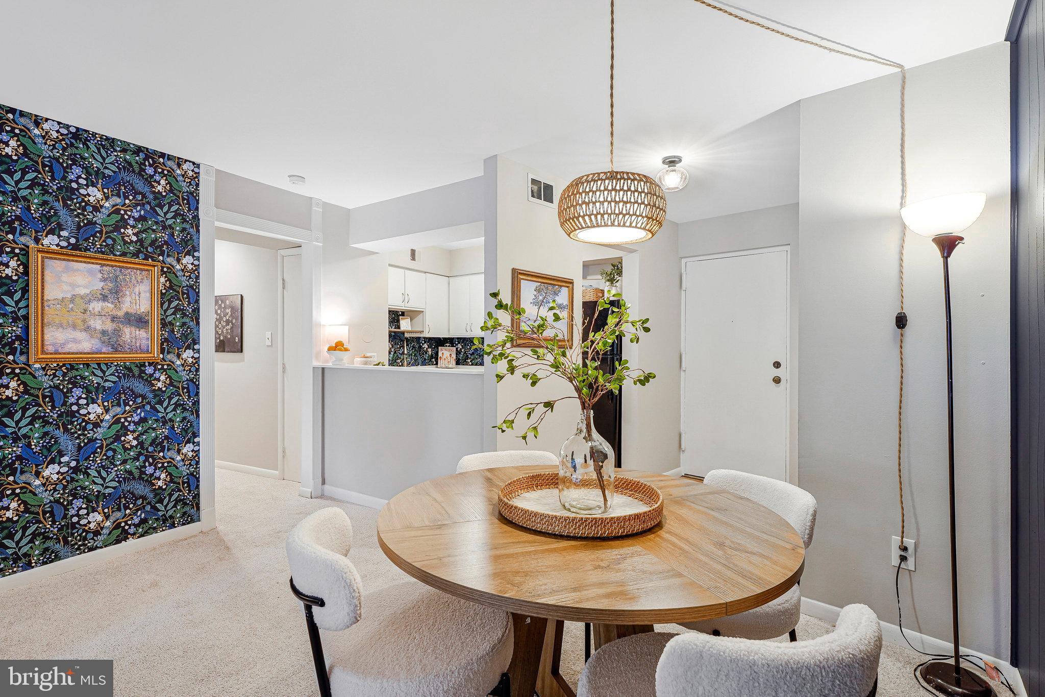 5778 Rexford Court, Unit 5778B Springfield, VA 22152 - Photo 3 of 55 a view of a dining room with furniture and chandelier