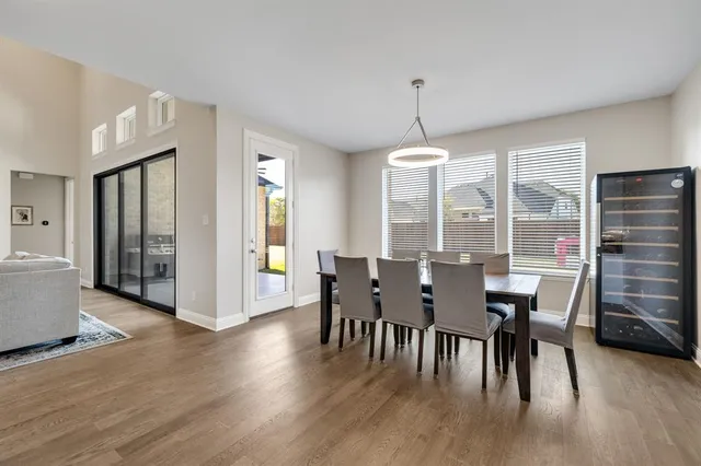 a dining room with furniture window wooden floor