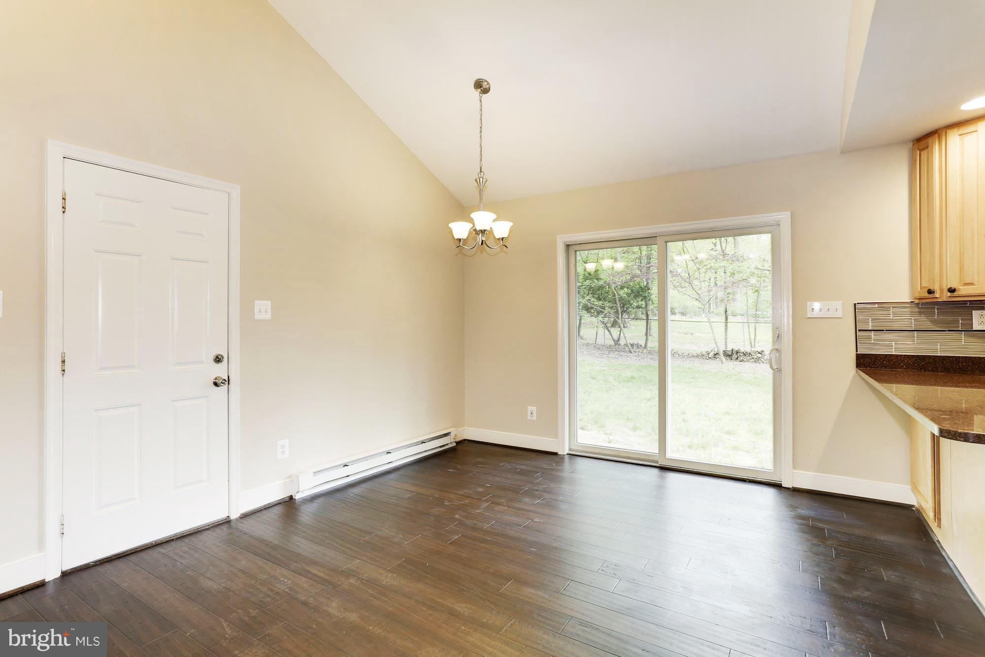 5804 Granby Road Derwood, MD 20855 - Photo 11 of 30 Family Room w/ Access to Backyard