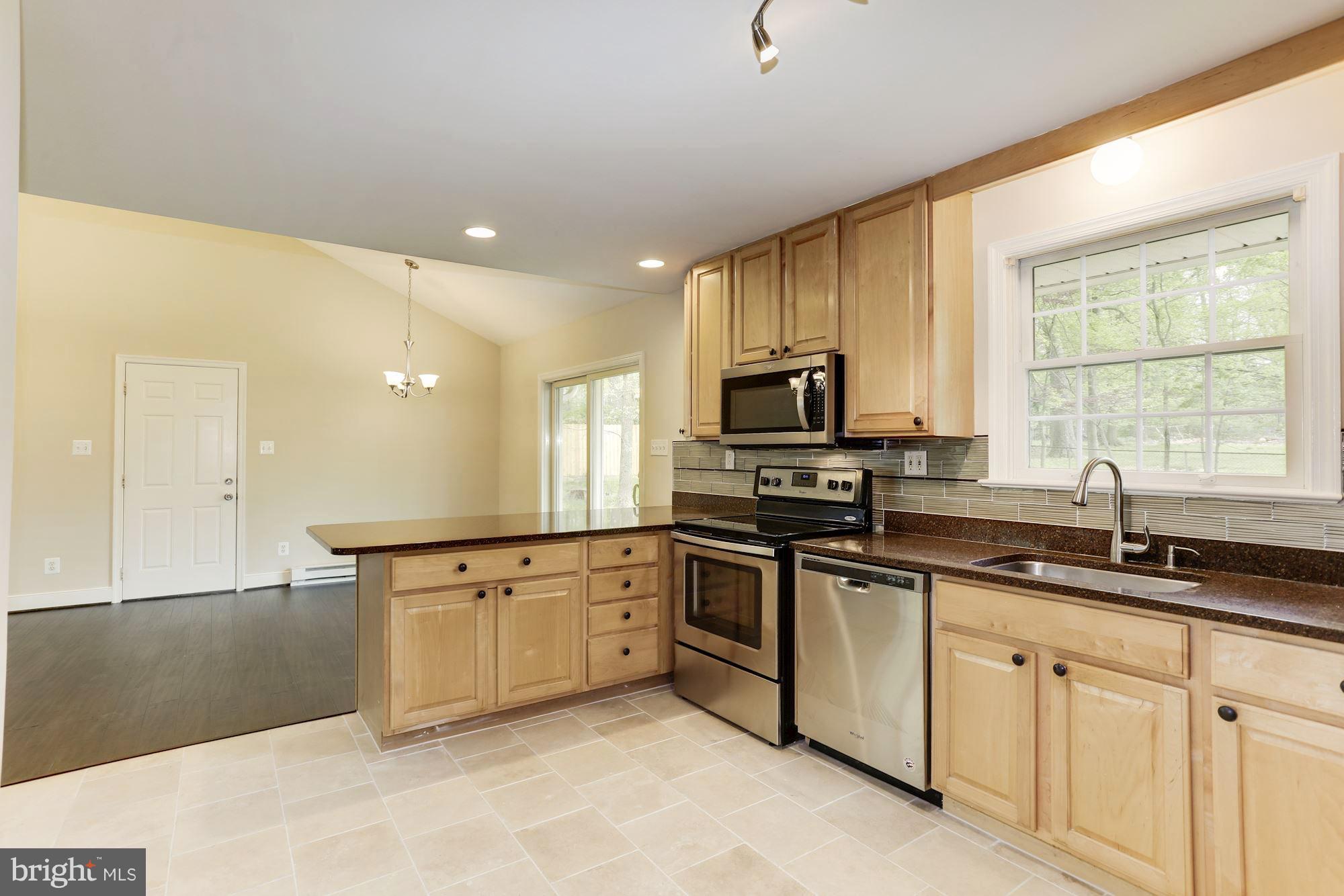 Oak Cabinets and Silestone Counter