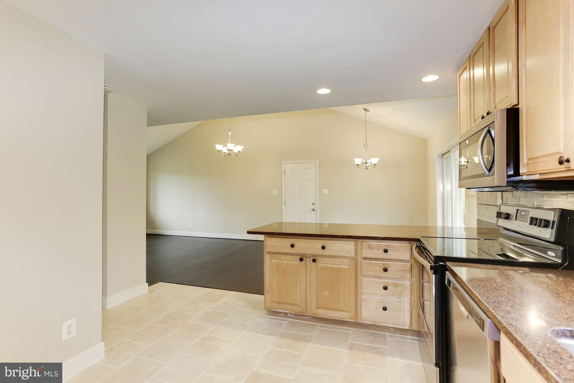 5804 Granby Road Derwood, MD 20855 - Photo 9 of 30 Expanded Kitchen Family Room