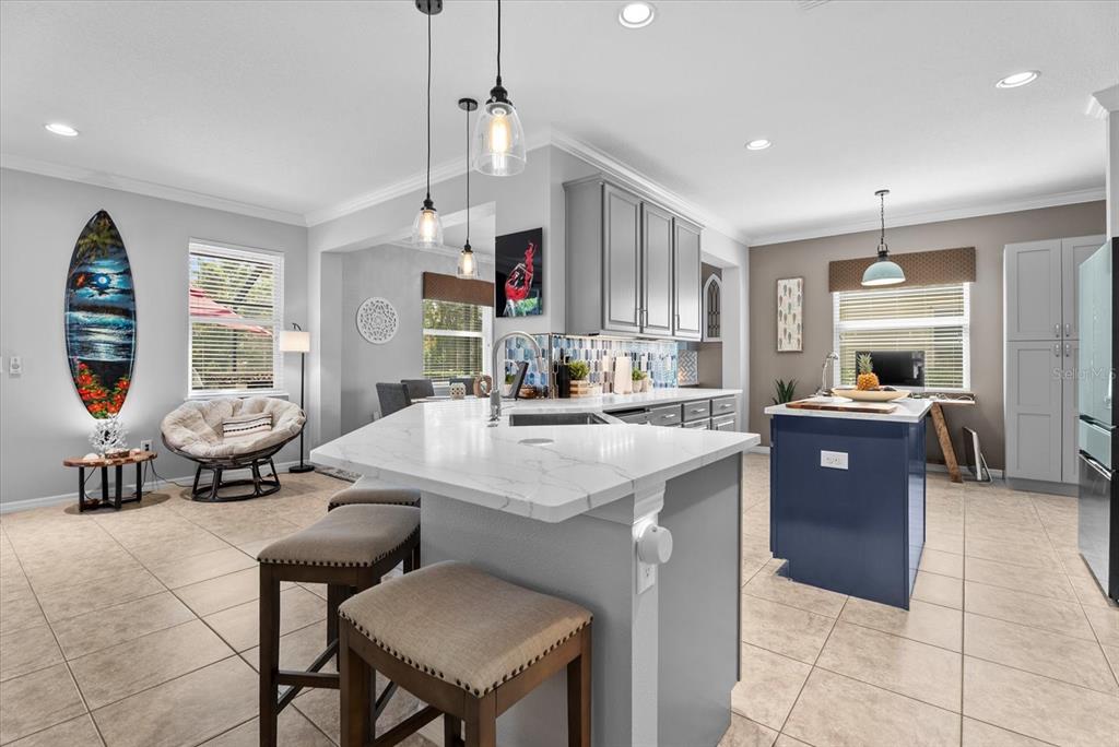 5439 Cartagena Drive Sarasota, FL 34233 - Photo 11 of 40 a kitchen with a sink a counter space and appliances