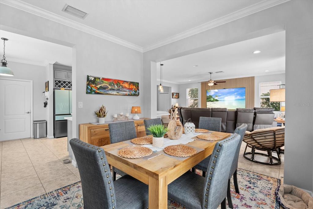 5439 Cartagena Drive Sarasota, FL 34233 - Photo 13 of 40 a view of a dining room with furniture
