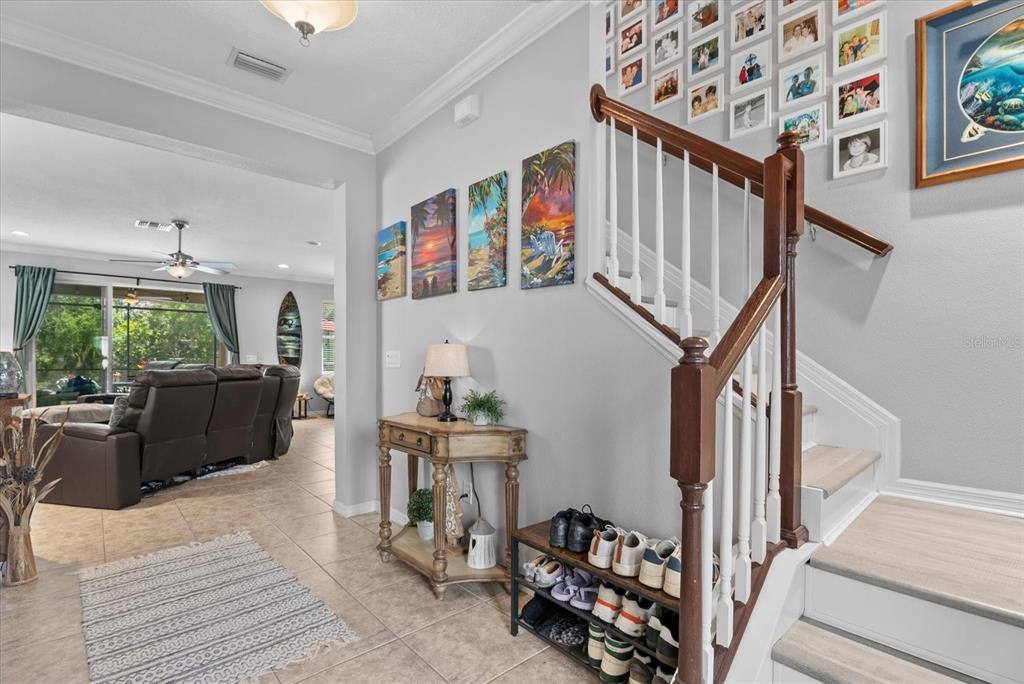 5439 Cartagena Drive Sarasota, FL 34233 - Photo 17 of 40 a view of entryway with wooden floor