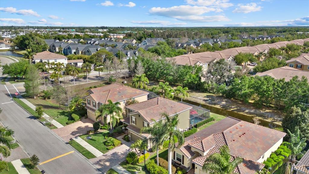 5439 Cartagena Drive Sarasota, FL 34233 - Photo 27 of 40 an aerial view of residential houses with outdoor space