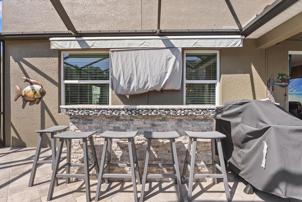5439 Cartagena Drive Sarasota, FL 34233 - Photo 37 of 40 a view of an outdoor space with seating area