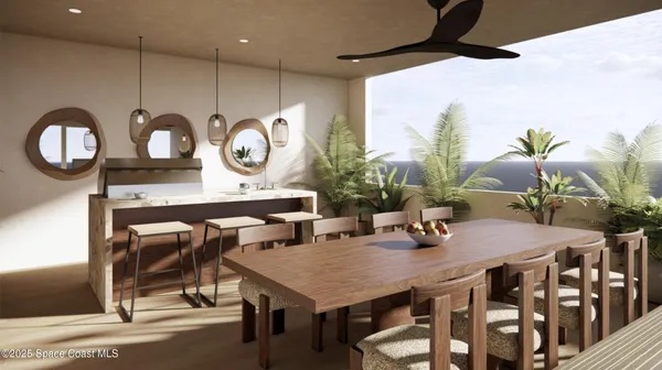 a view of a dining room with furniture and a chandelier