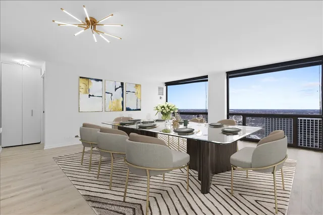 a view of a dining room with furniture