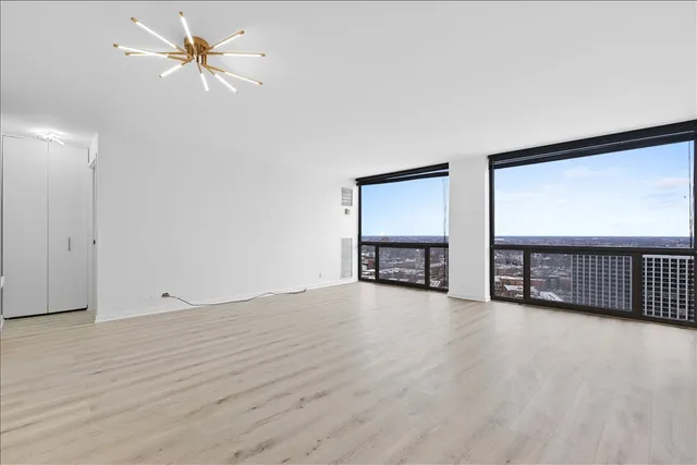 a view of an empty room with a window