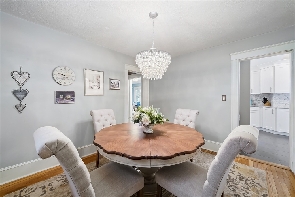 4 Wescott Road Stoneham, MA 02180 - Photo 14 of 42 a view of a dining room with furniture and wooden floor