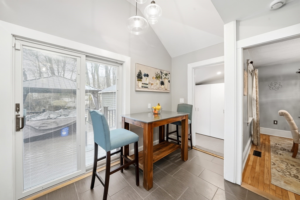 4 Wescott Road Stoneham, MA 02180 - Photo 20 of 42 a living room with furniture and a table