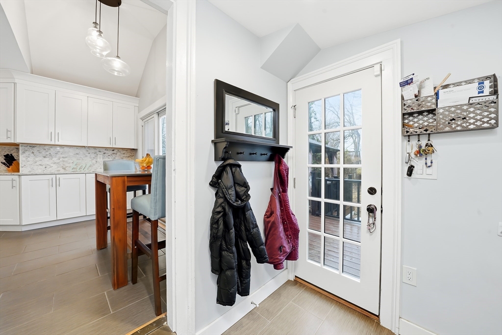 4 Wescott Road Stoneham, MA 02180 - Photo 22 of 42 a view of a walk in closet with clothes and shoes