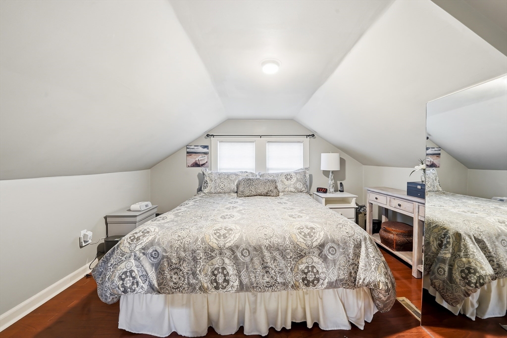 4 Wescott Road Stoneham, MA 02180 - Photo 23 of 42 a bedroom with a bed and window