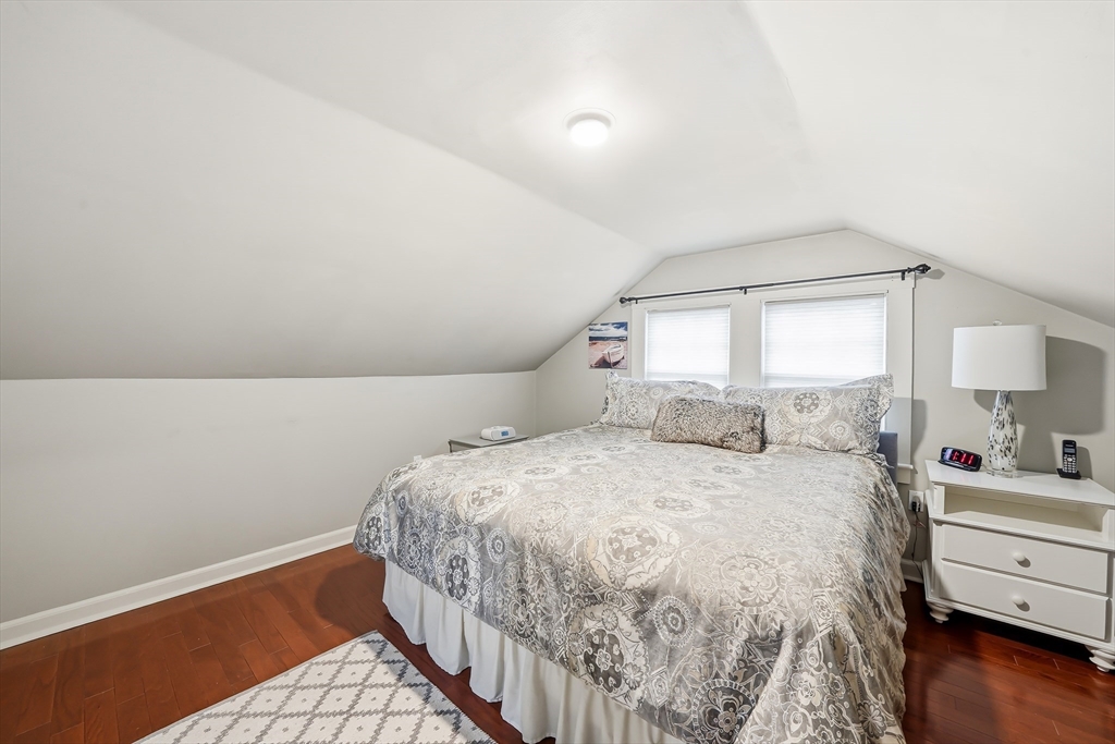 4 Wescott Road Stoneham, MA 02180 - Photo 24 of 42 a bedroom with a bed and a window