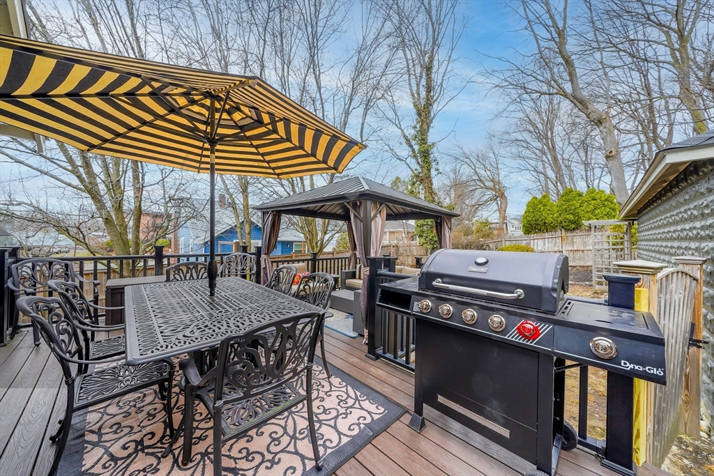 4 Wescott Road Stoneham, MA 02180 - Photo 34 of 42 a view of a dinning table and chairs in patio
