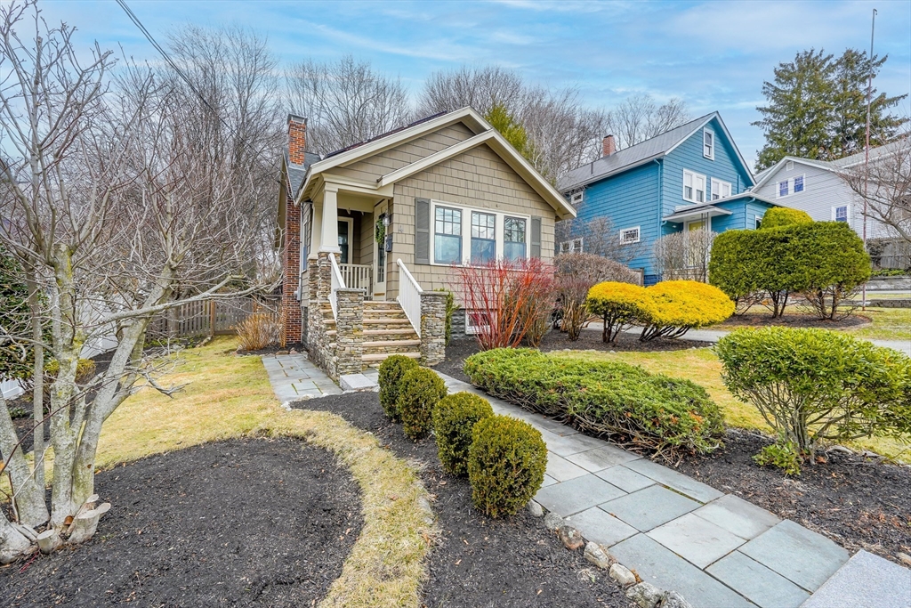 4 Wescott Road Stoneham, MA 02180 - Photo 39 of 42 a front view of a house with garden