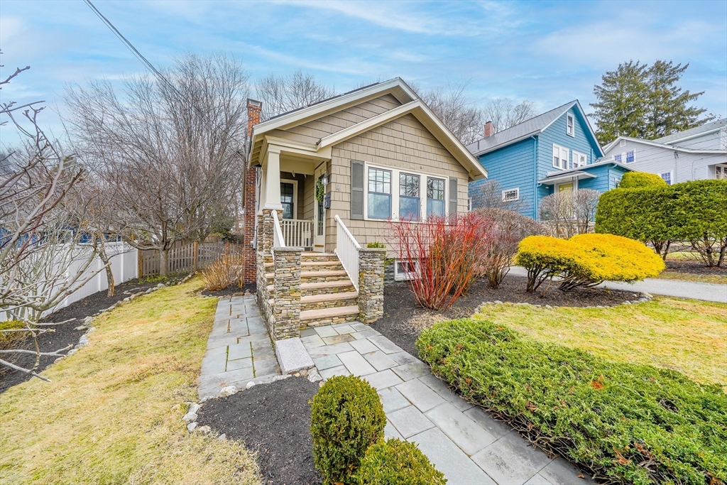 4 Wescott Road Stoneham, MA 02180 - Photo 40 of 42 a view of a house with a yard and sitting area
