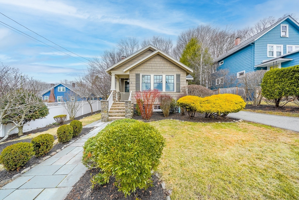 4 Wescott Road Stoneham, MA 02180 - Photo 41 of 42 a front view of a house with garden