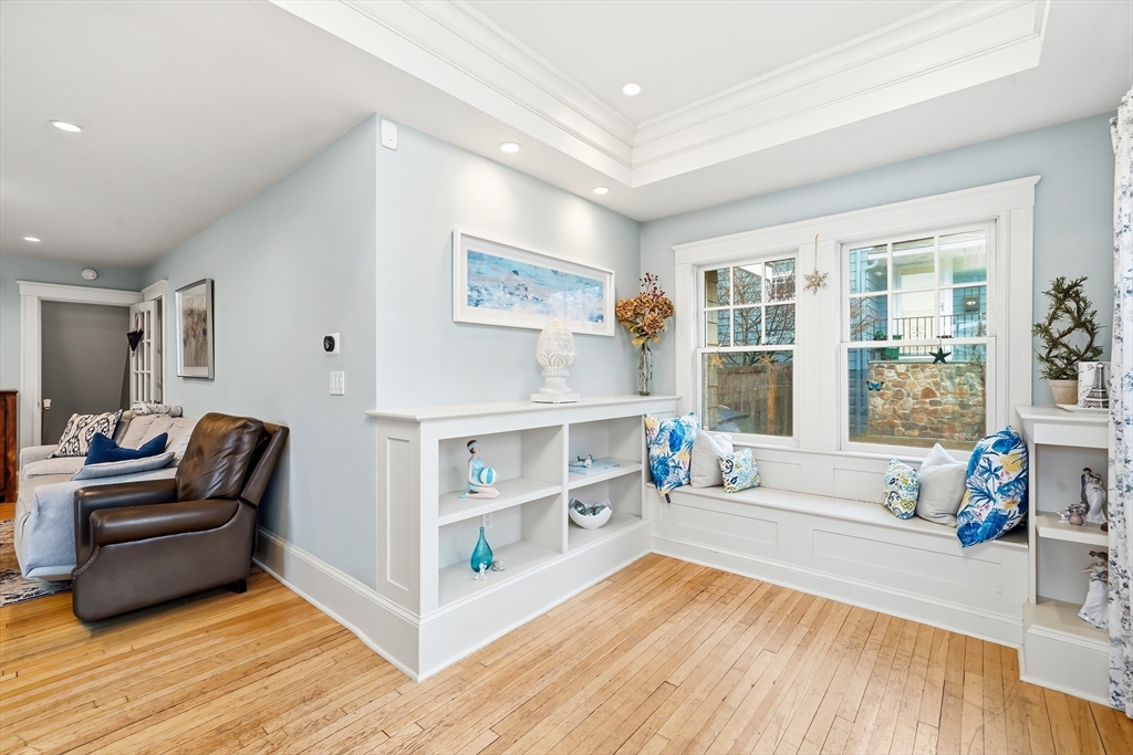4 Wescott Road Stoneham, MA 02180 - Photo 5 of 42 a living room with furniture and a large window