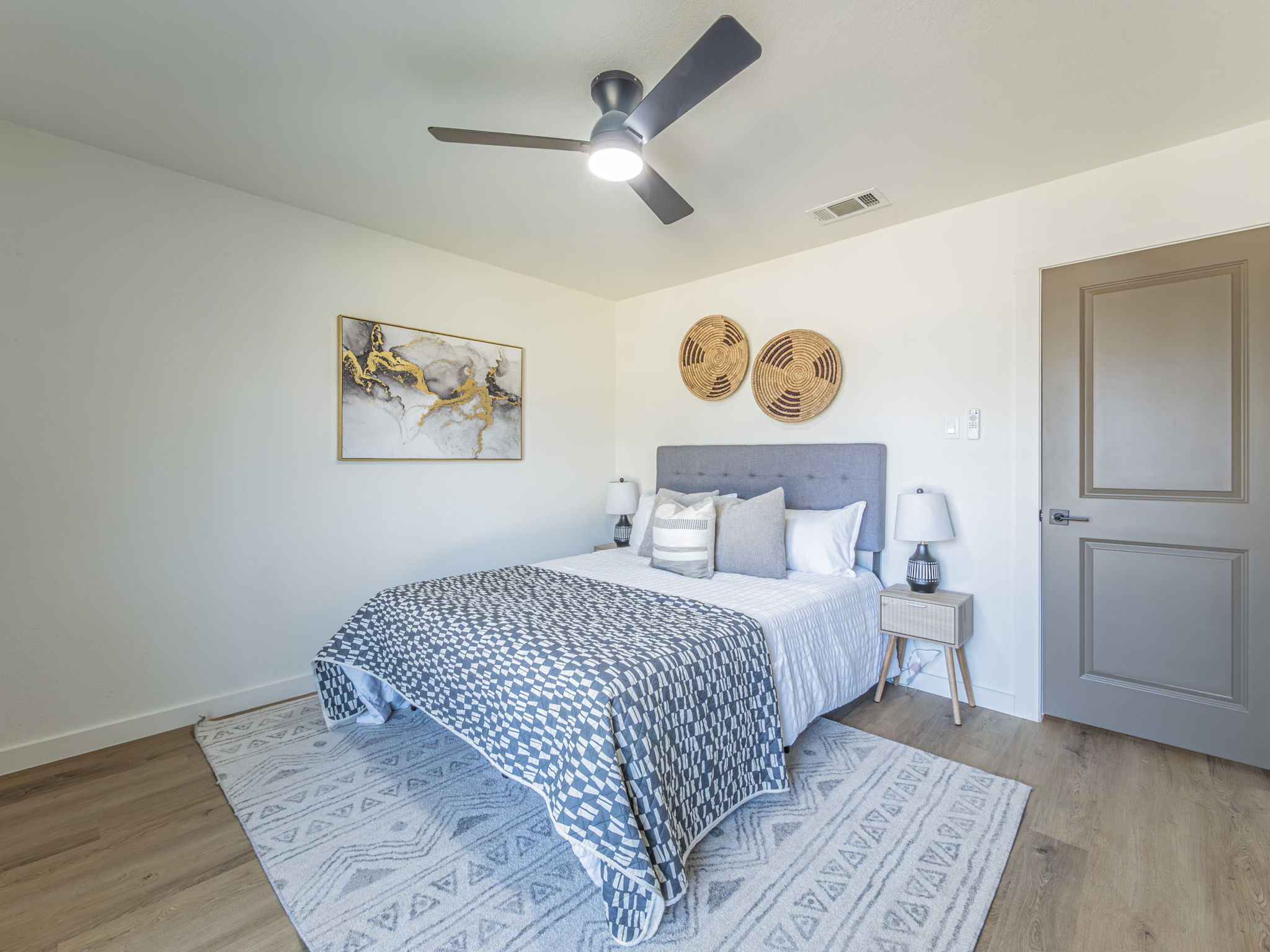 906 Fall Creek Drive Austin, TX 78753 - Photo 15 of 25 Bedroom with light wood-type flooring and ceiling fan