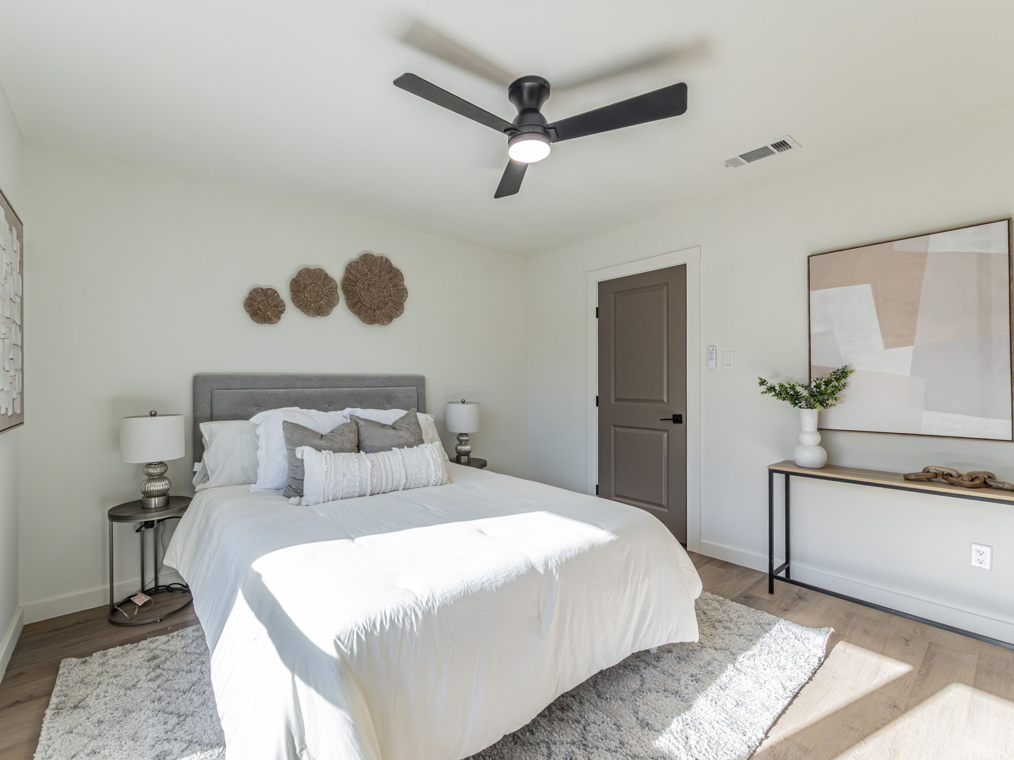 906 Fall Creek Drive Austin, TX 78753 - Photo 18 of 25 Bedroom with wood finished floors and a ceiling fan