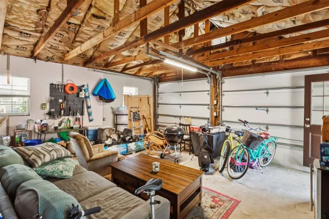 a view of gym equipment with outdoor seating